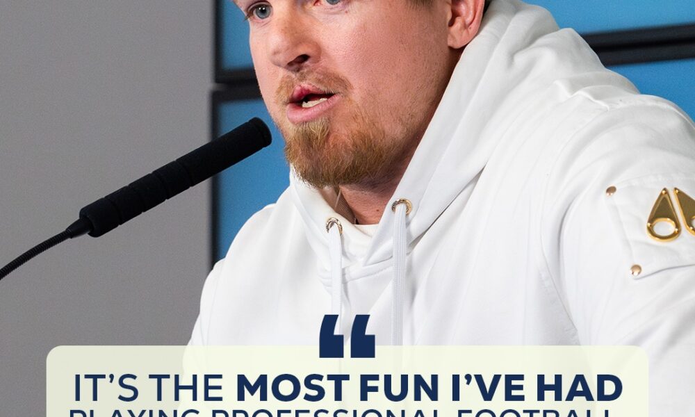 Athlete Adam Bighill speaking at a press conference; quote overlay reads: 'It’s the most fun I’ve had playing professional football.'
